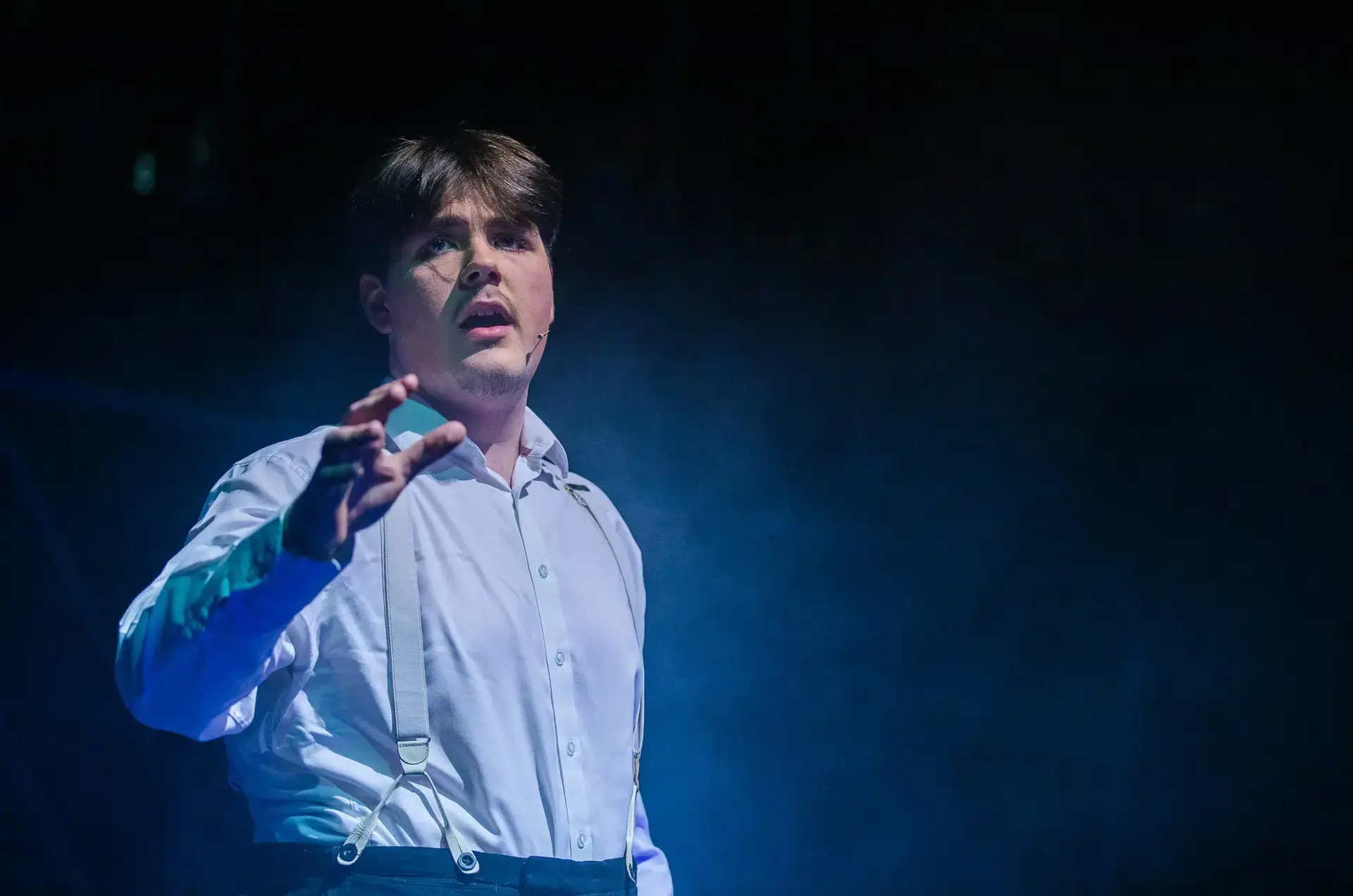 Student performing on stage at St Chris