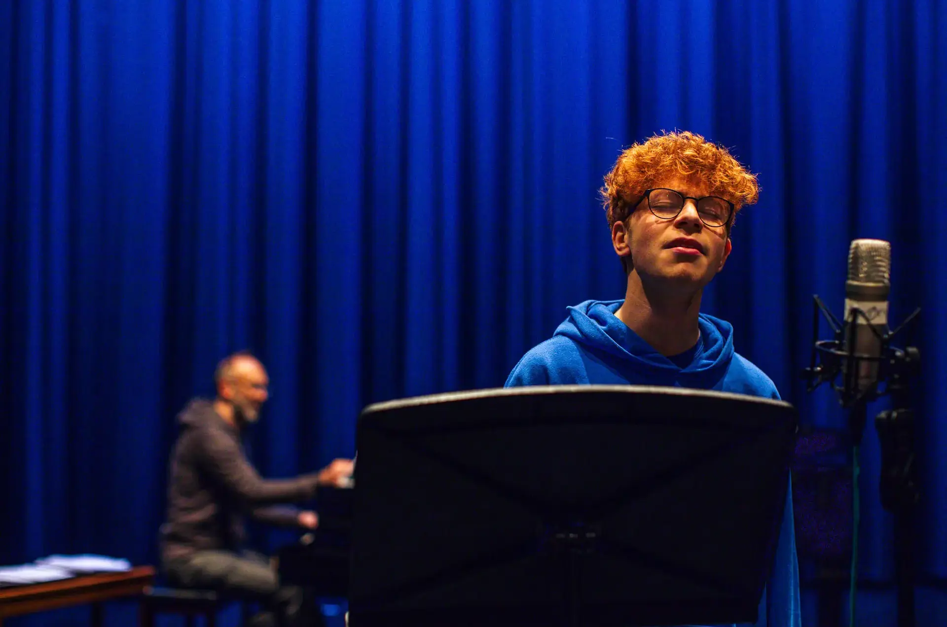 Senior School student singing at St Chris